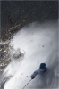 Wille Lindberg à Serre-Chevalier. Il était tard dans l'après-midi et il neigeait. J'ai sous-exposé le ciel pour que l'ambiance sois plus sombre qu'en réalité et j'ai envoyé un flash.